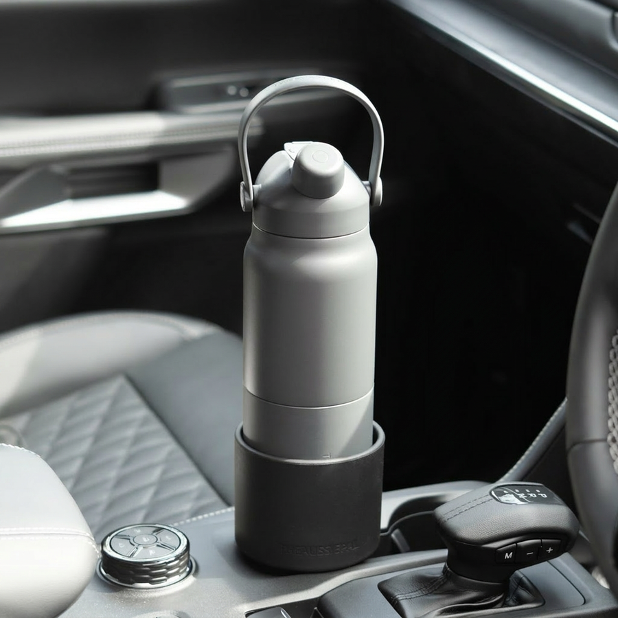 Aussie Pal 1L bottle secure in the in-house Car Cupholder